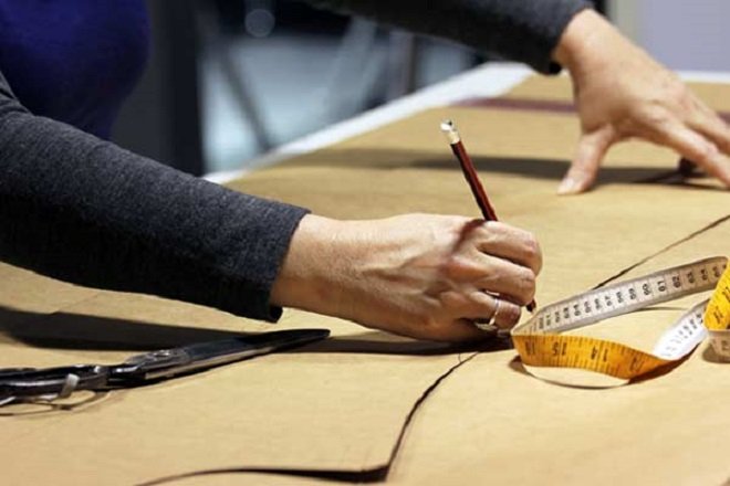Pattern development and fabric measurement for custom sportswear