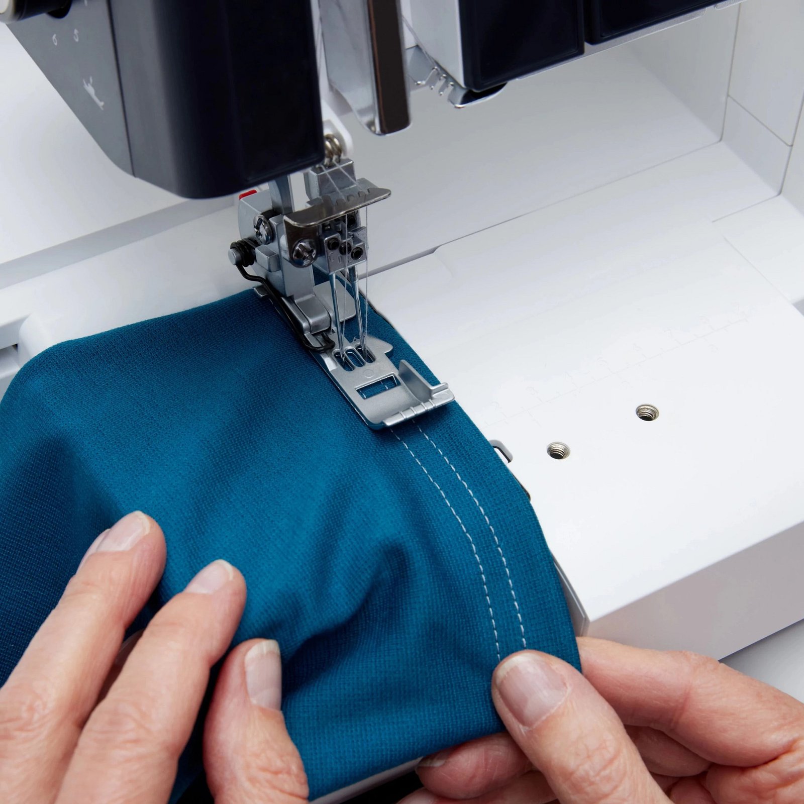 Industrial stitching during sportswear garment construction